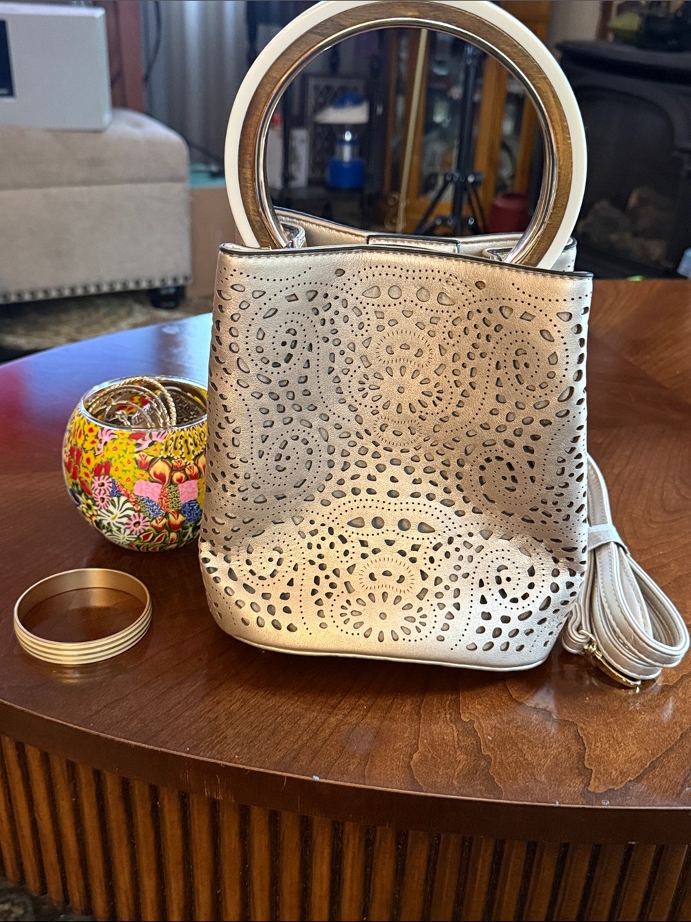Laser-Cut Metallic Cream Circle-Handle Crossbody Bag